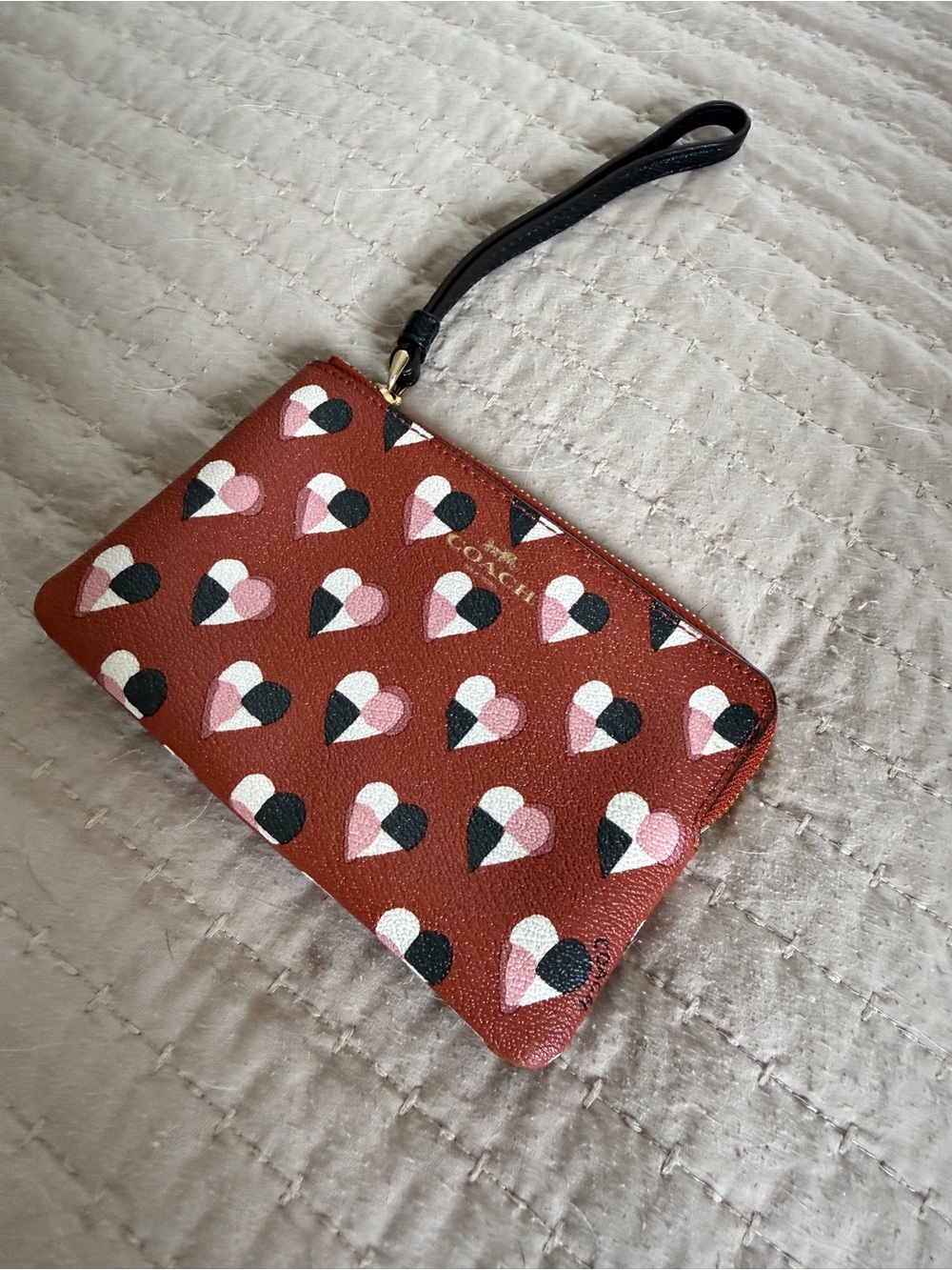 Coach Rust Heart Print Wristlet with Black Strap